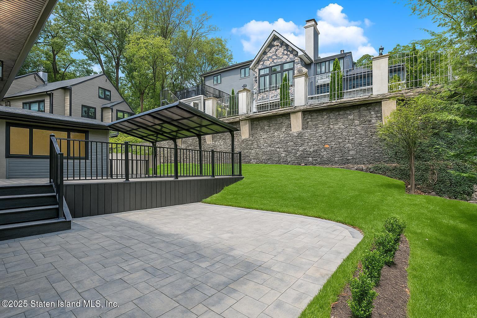 113 Longview Road Staten Island, NY 10304 - Photo 4 of 35 a view of house with yard and entertaining space