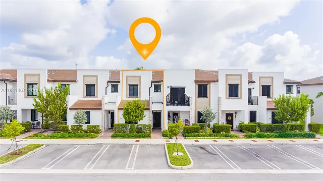 a view of a building with a garden