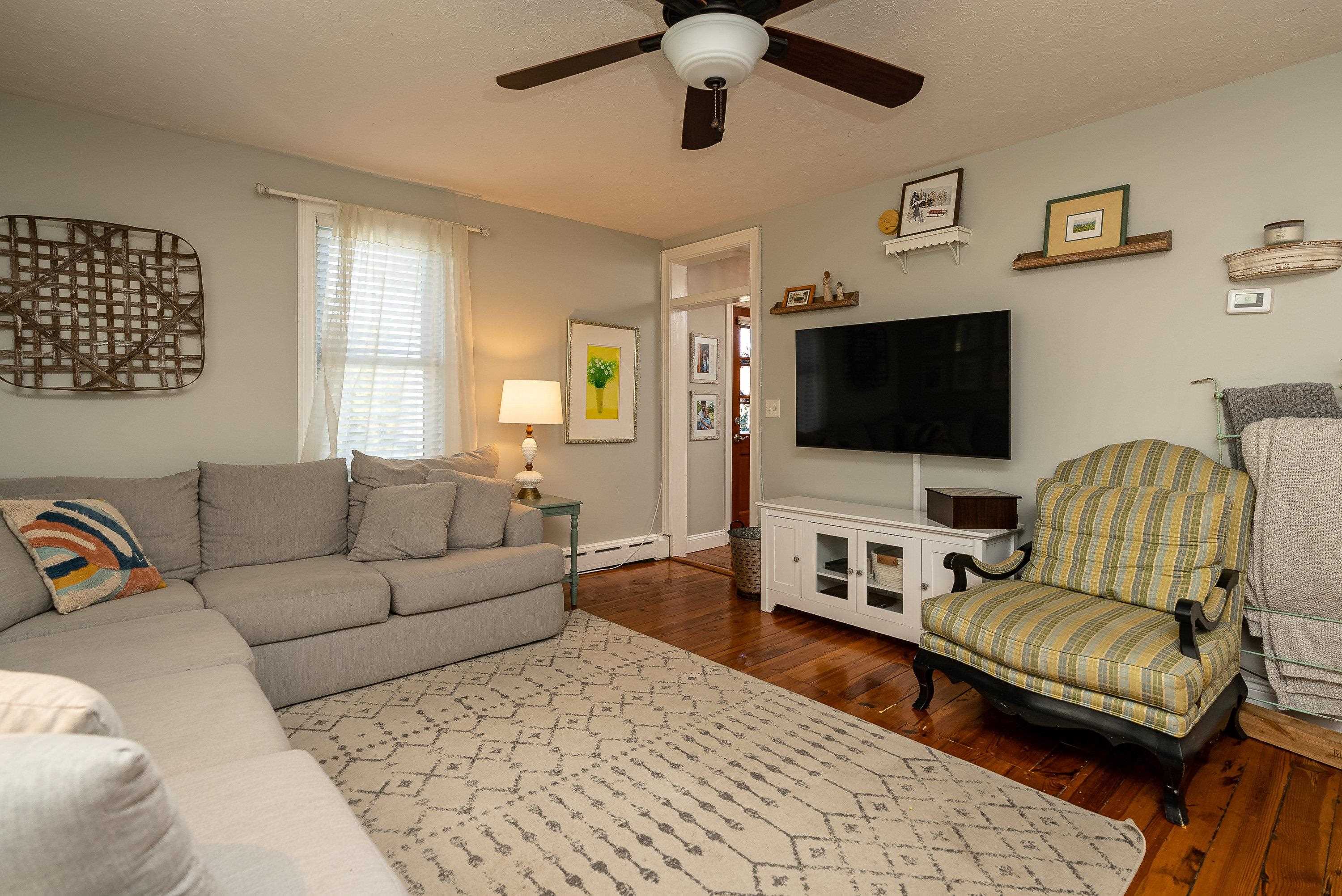 3667 Dry Hollow Road Dayton, VA 22821 - Photo 12 of 68 a living room with furniture and a flat screen tv