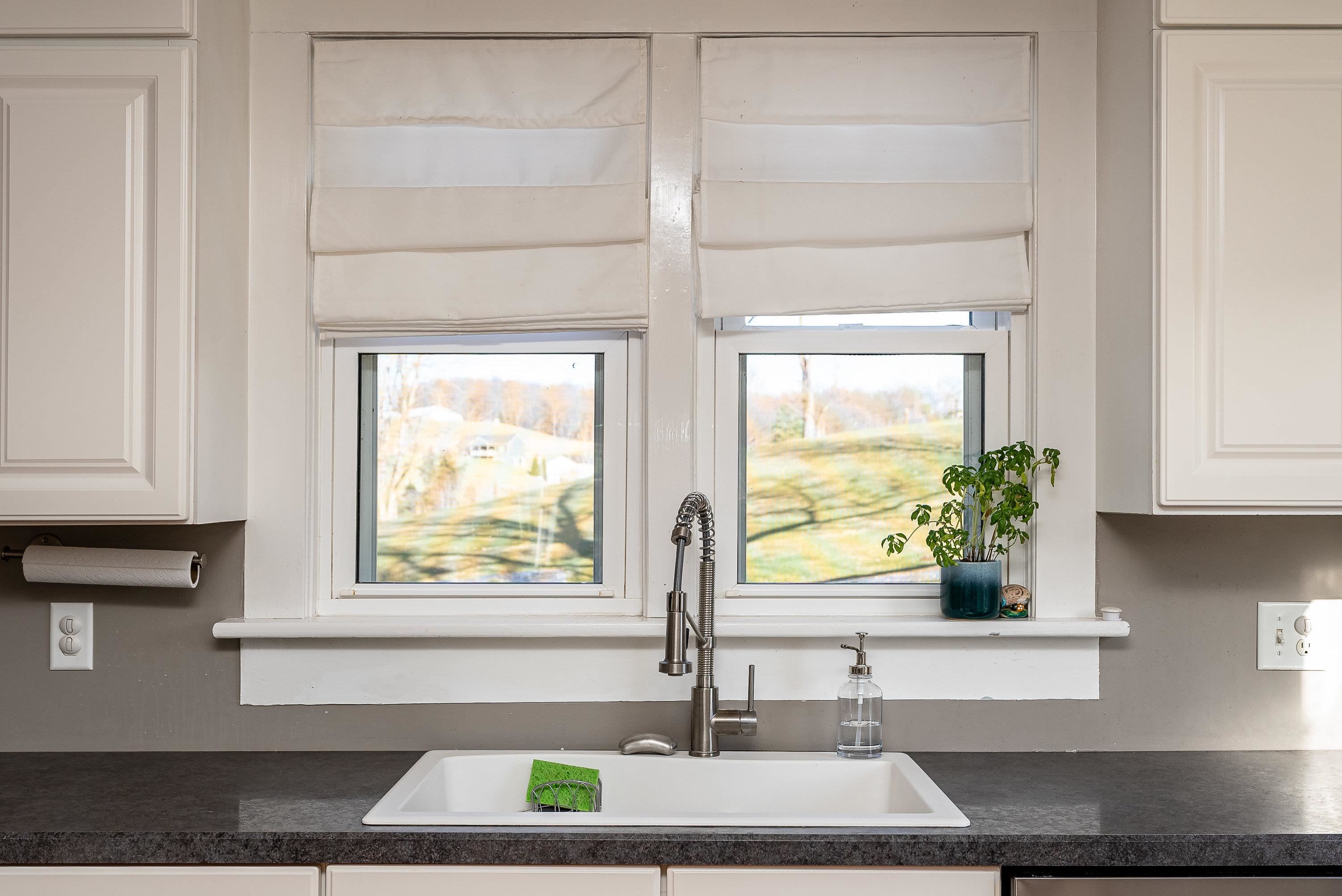 3667 Dry Hollow Road Dayton, VA 22821 - Photo 15 of 68 a kitchen with kitchen island a window a sink and a counter in it