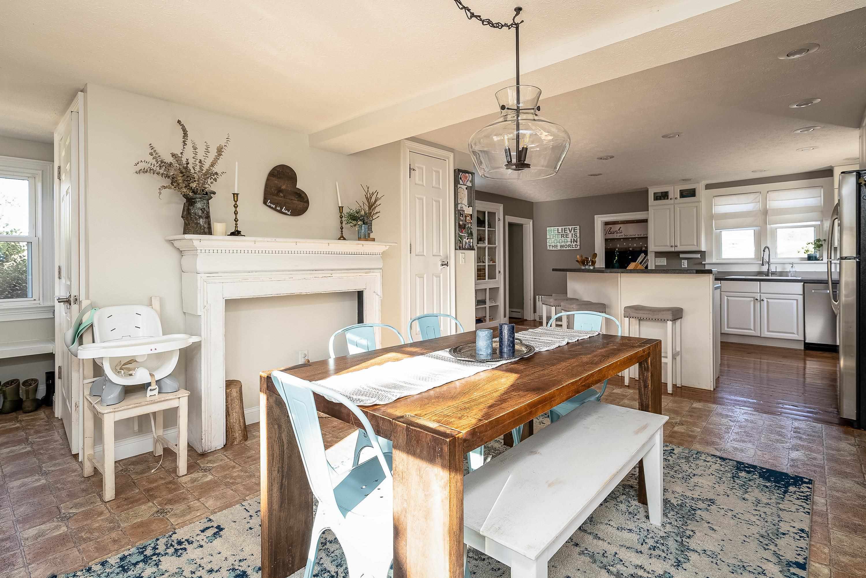 3667 Dry Hollow Road Dayton, VA 22821 - Photo 20 of 68 a living room with stainless steel appliances kitchen island granite countertop furniture and a fireplace