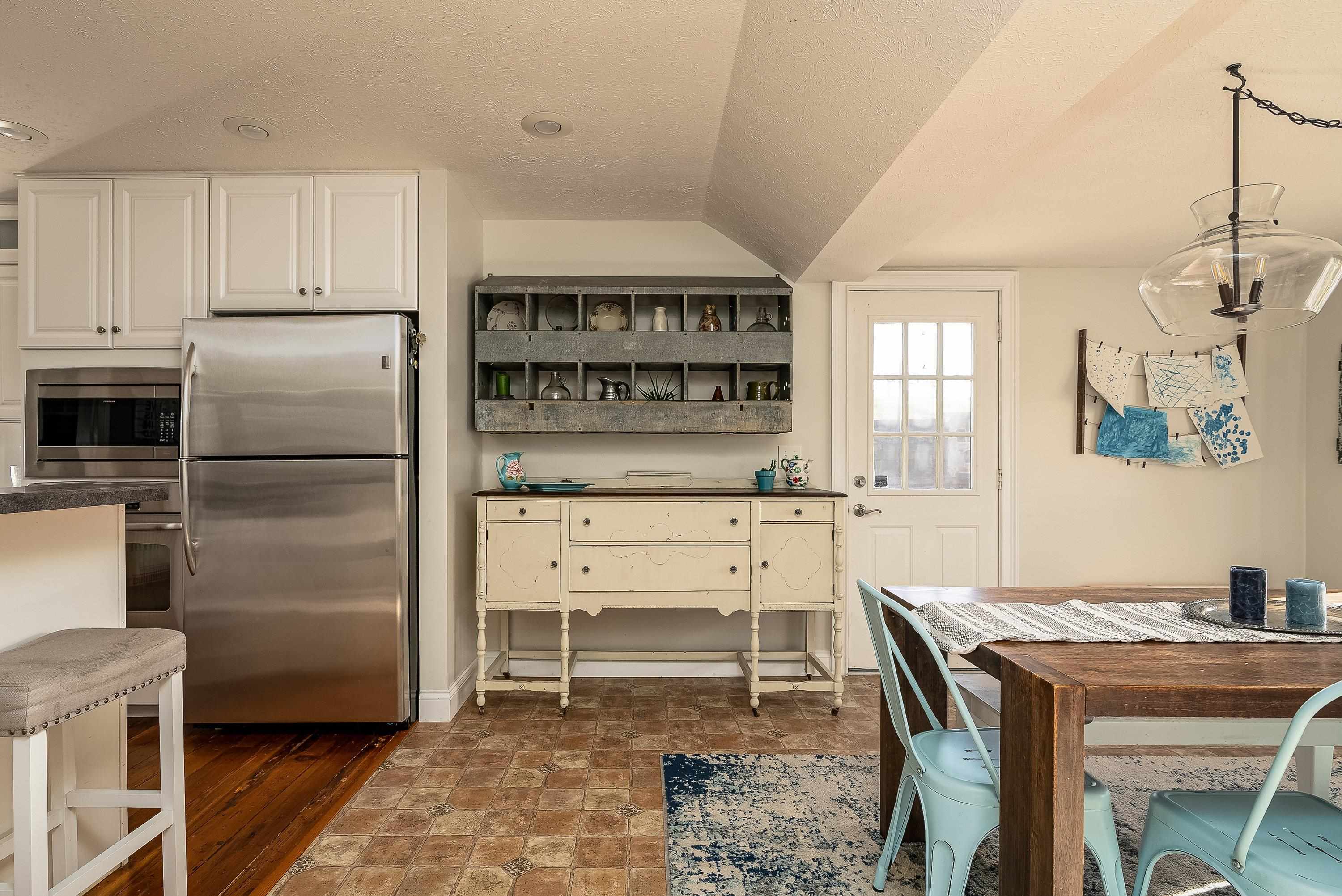 3667 Dry Hollow Road Dayton, VA 22821 - Photo 21 of 68 a kitchen with a table and chairs