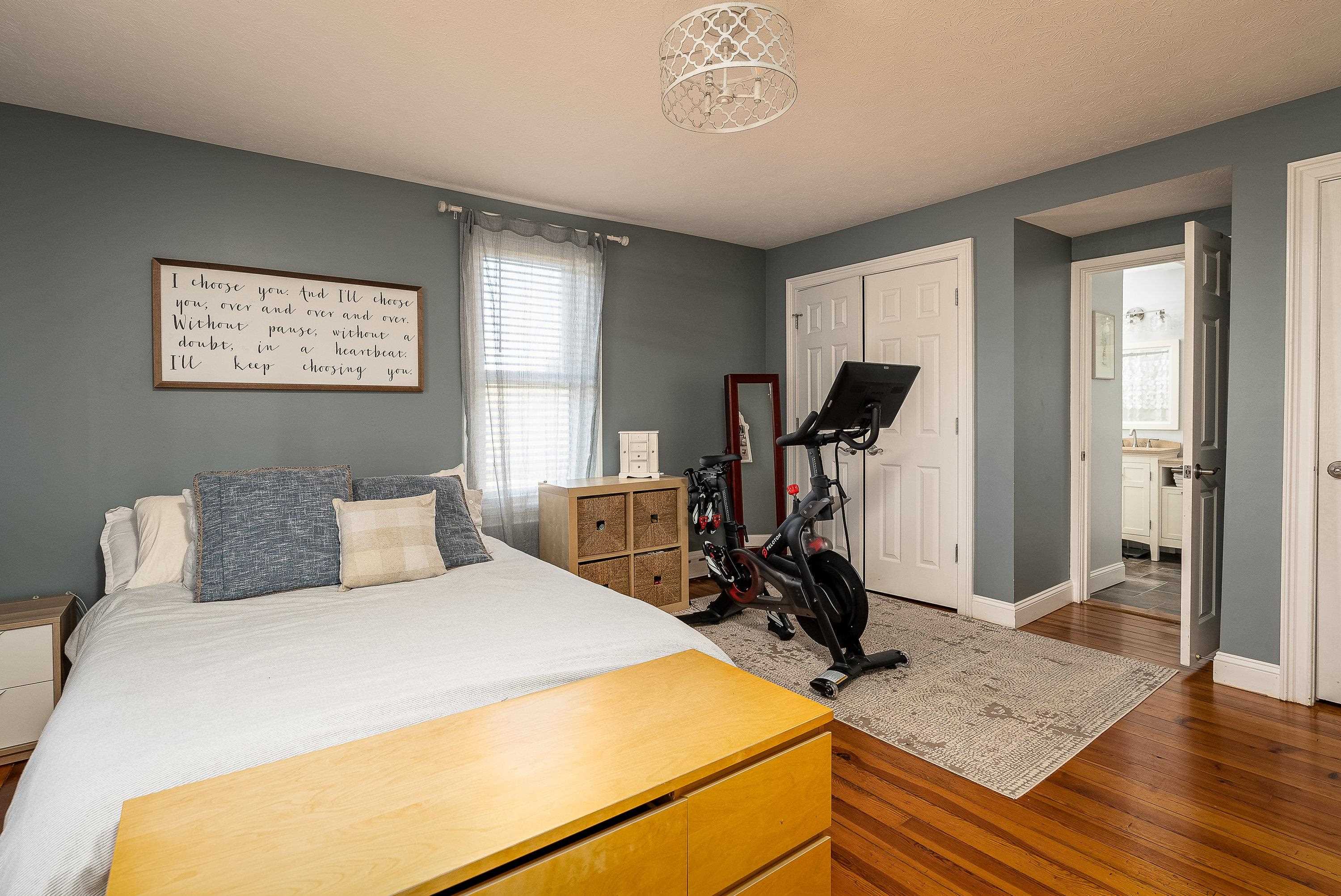 3667 Dry Hollow Road Dayton, VA 22821 - Photo 24 of 68 a bedroom with a bed and wooden floor