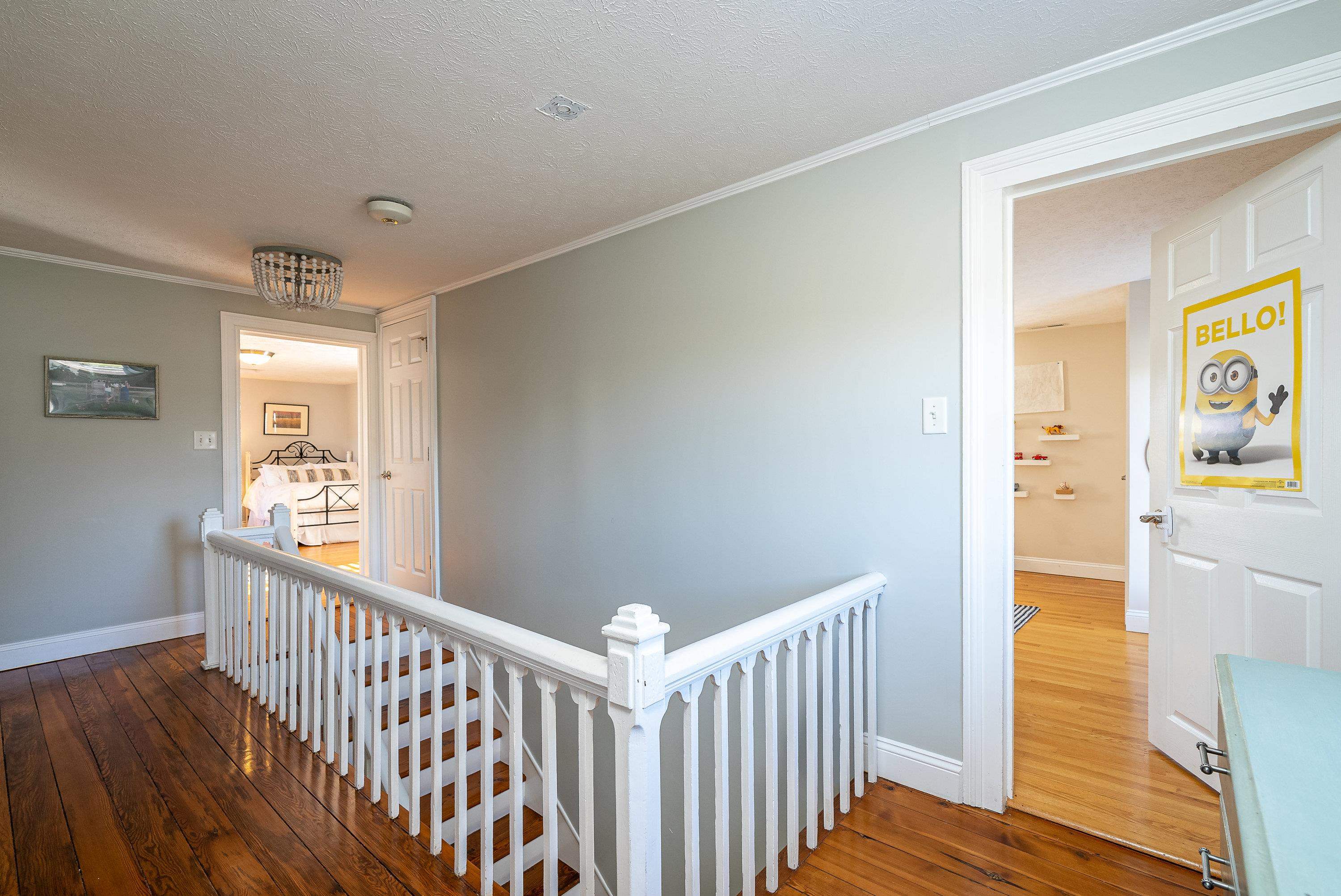 3667 Dry Hollow Road Dayton, VA 22821 - Photo 29 of 68 a view of a hallway with wooden floor and windows
