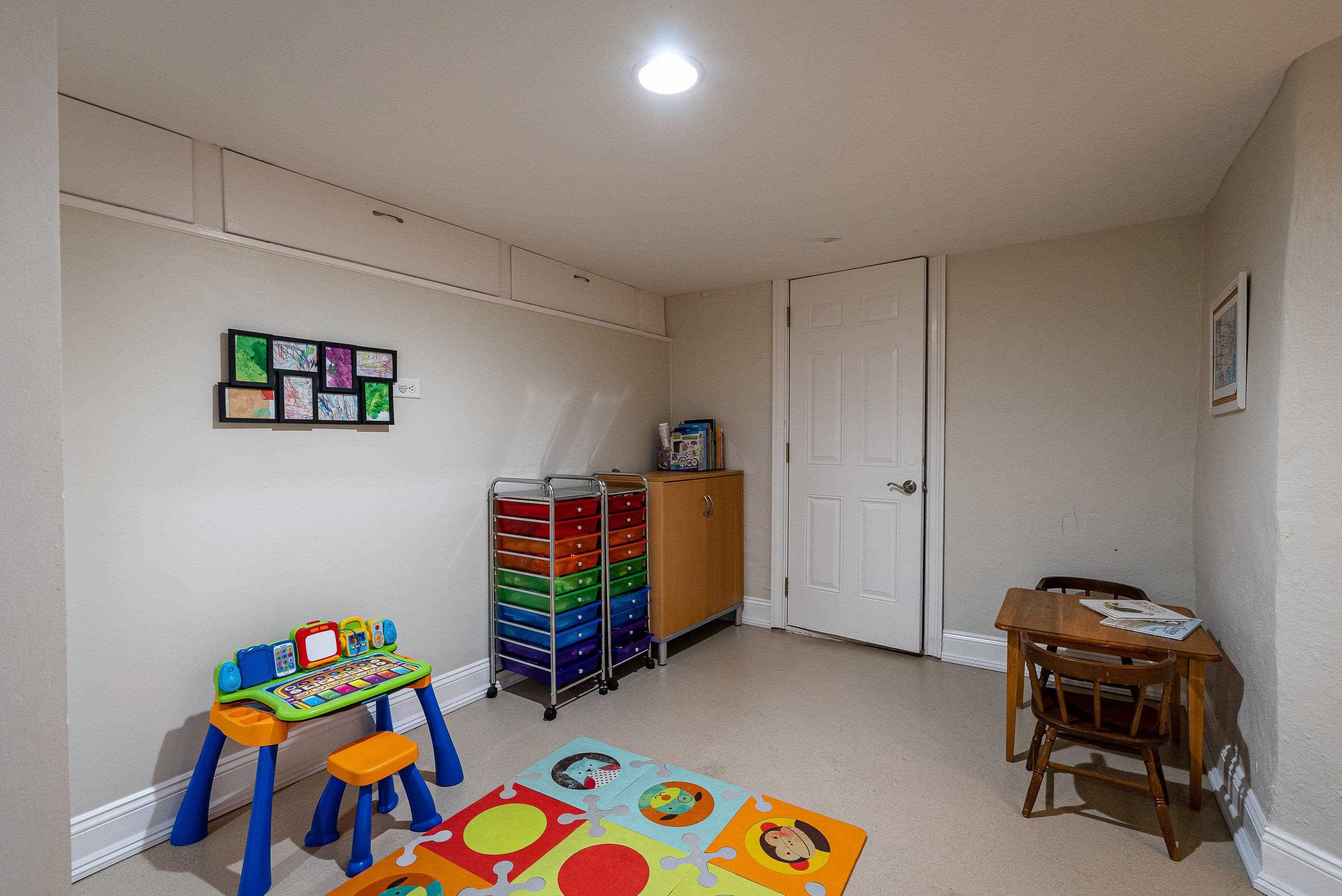 3667 Dry Hollow Road Dayton, VA 22821 - Photo 39 of 68 a room with toys and a wooden floor