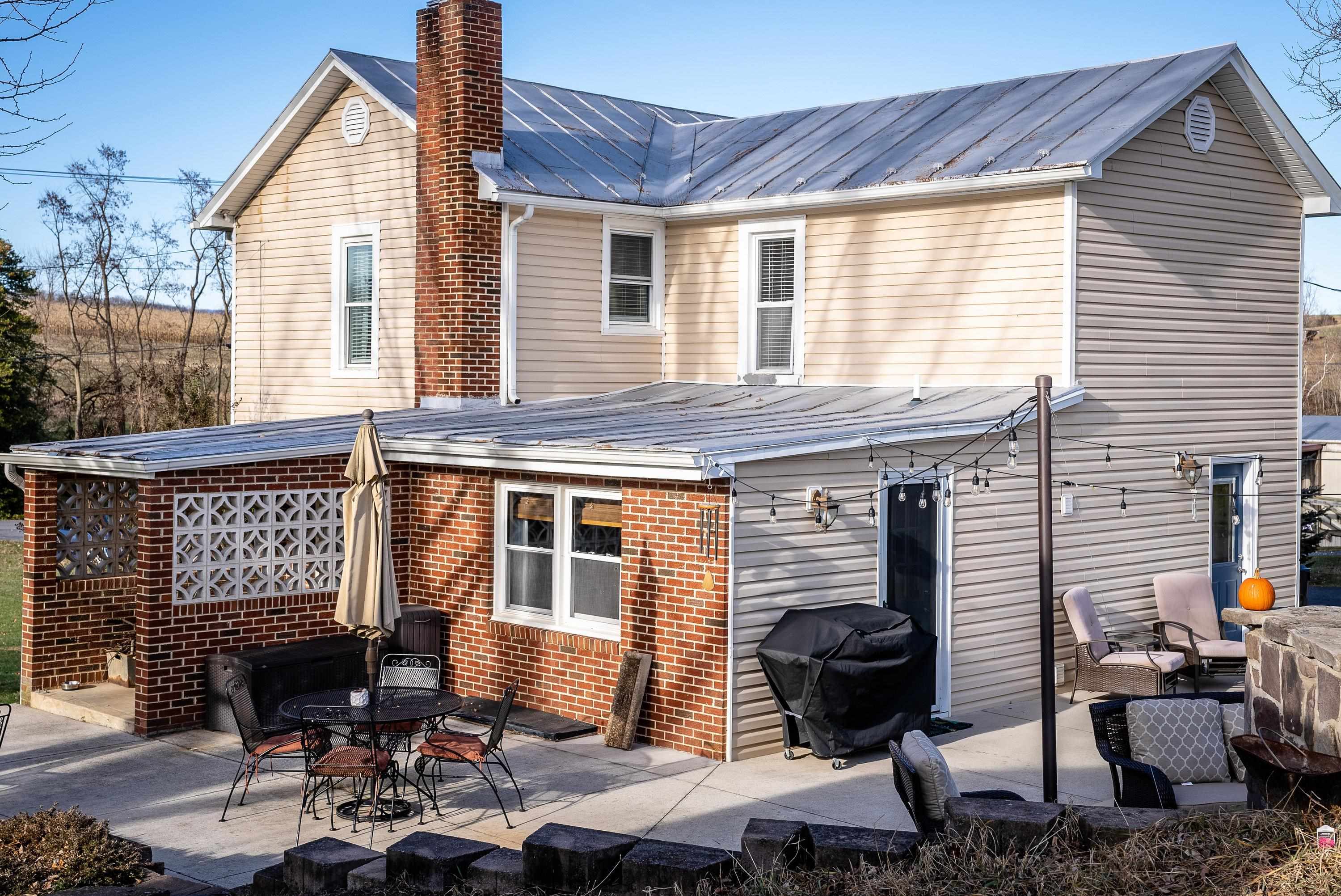 3667 Dry Hollow Road Dayton, VA 22821 - Photo 5 of 68 a front view of a house with patio