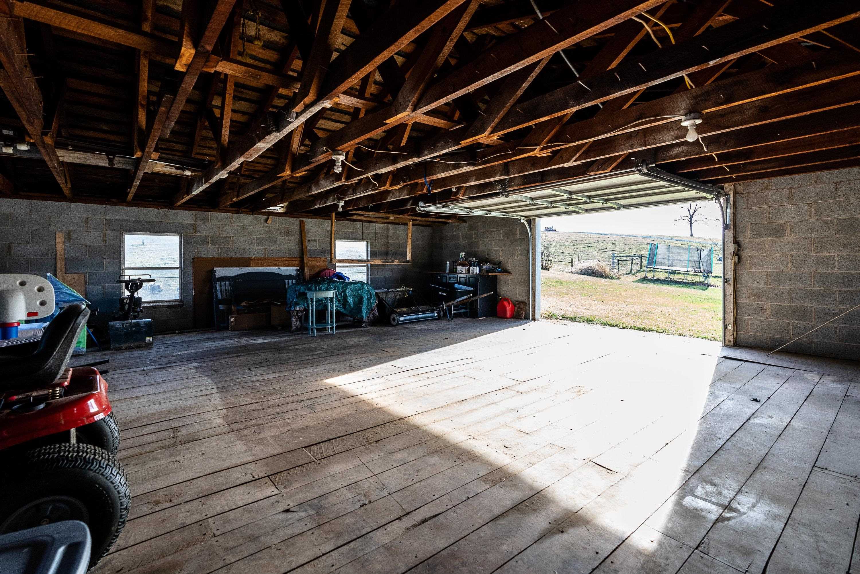 3667 Dry Hollow Road Dayton, VA 22821 - Photo 52 of 68 a view of a garage with wooden floor