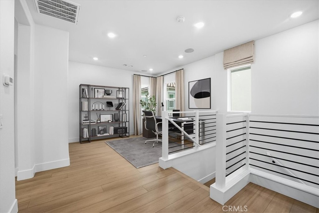 437 Willow Run Lane Carson, CA 90745 - Photo 14 of 37 a view of a livingroom with furniture and windows