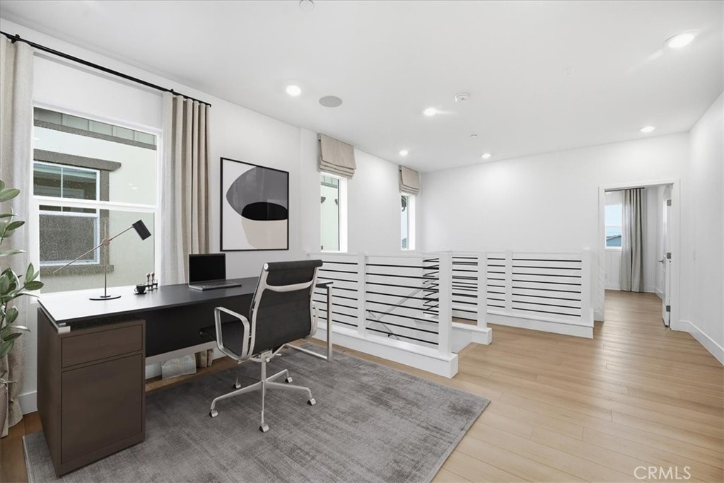 437 Willow Run Lane Carson, CA 90745 - Photo 15 of 37 a view of work space with wooden floor and furniture