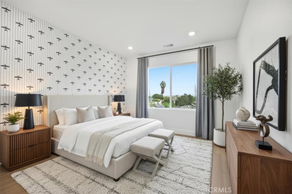 437 Willow Run Lane Carson, CA 90745 - Photo 24 of 37 a bedroom with a bed and a flat screen tv