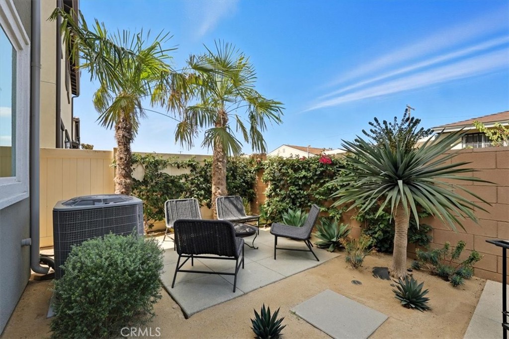 437 Willow Run Lane Carson, CA 90745 - Photo 29 of 37 a view of backyard with outdoor seating and plants
