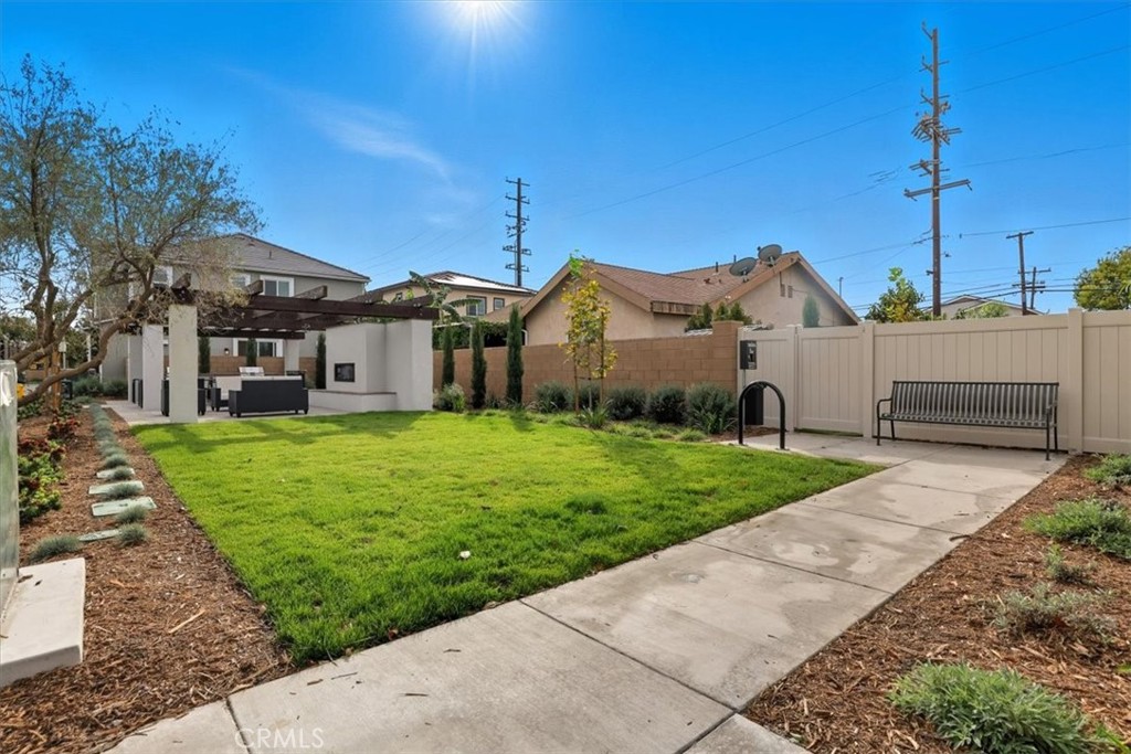 437 Willow Run Lane Carson, CA 90745 - Photo 33 of 37 a view of a house with a yard