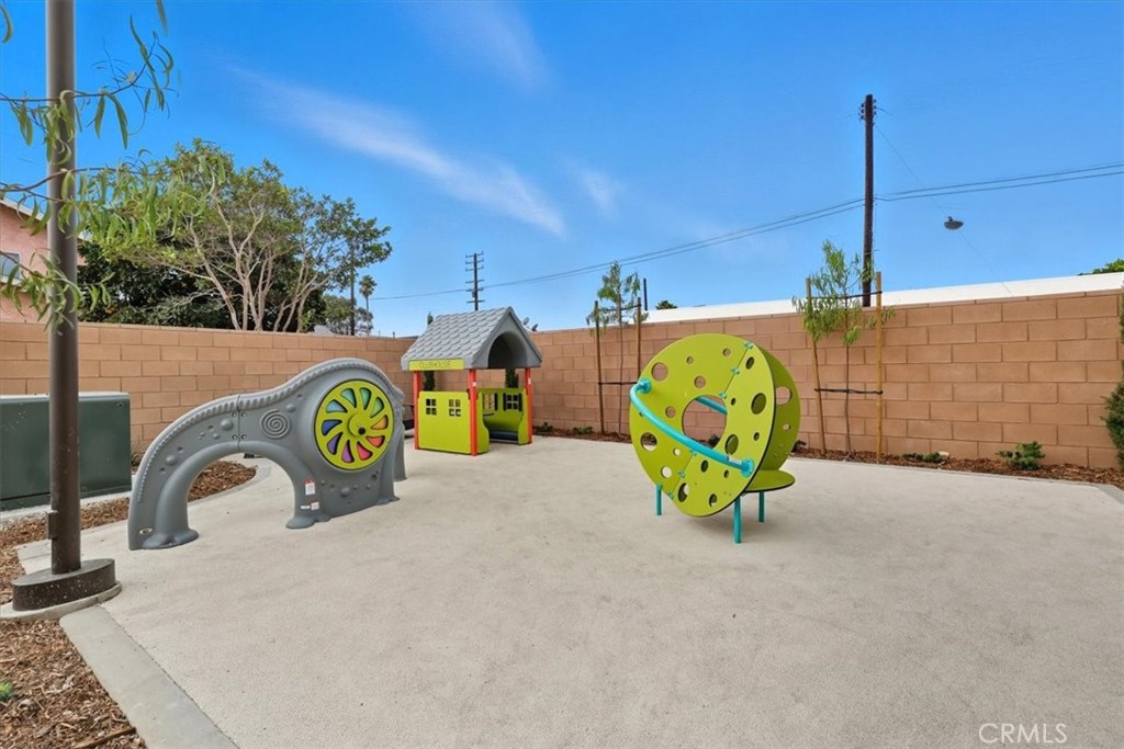 437 Willow Run Lane Carson, CA 90745 - Photo 34 of 37 a view of a park with slide