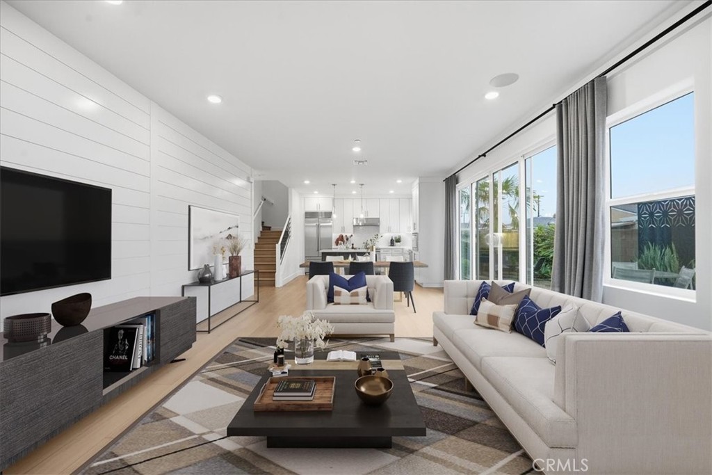 437 Willow Run Lane Carson, CA 90745 - Photo 5 of 37 a living room with furniture and a flat screen tv