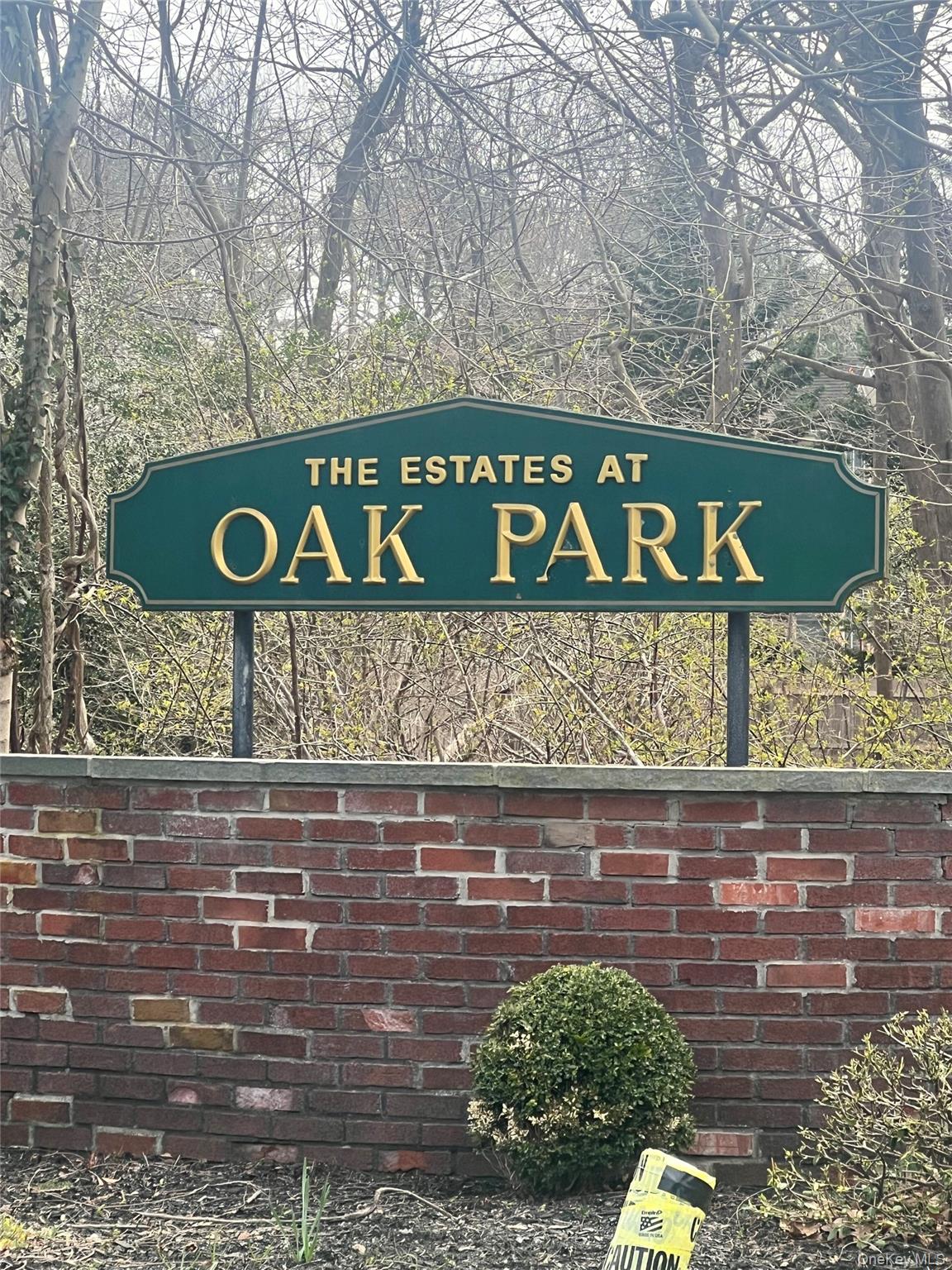 Springview Court East Patchogue, NY 11772 - Photo 2 of 6 a street sign on a brick wall