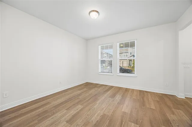 an empty room with windows