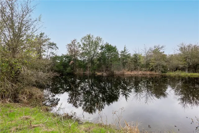 a view of lake with mountain in the background