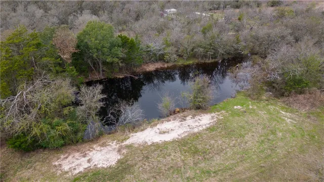 a view of outdoor space with deck and yard