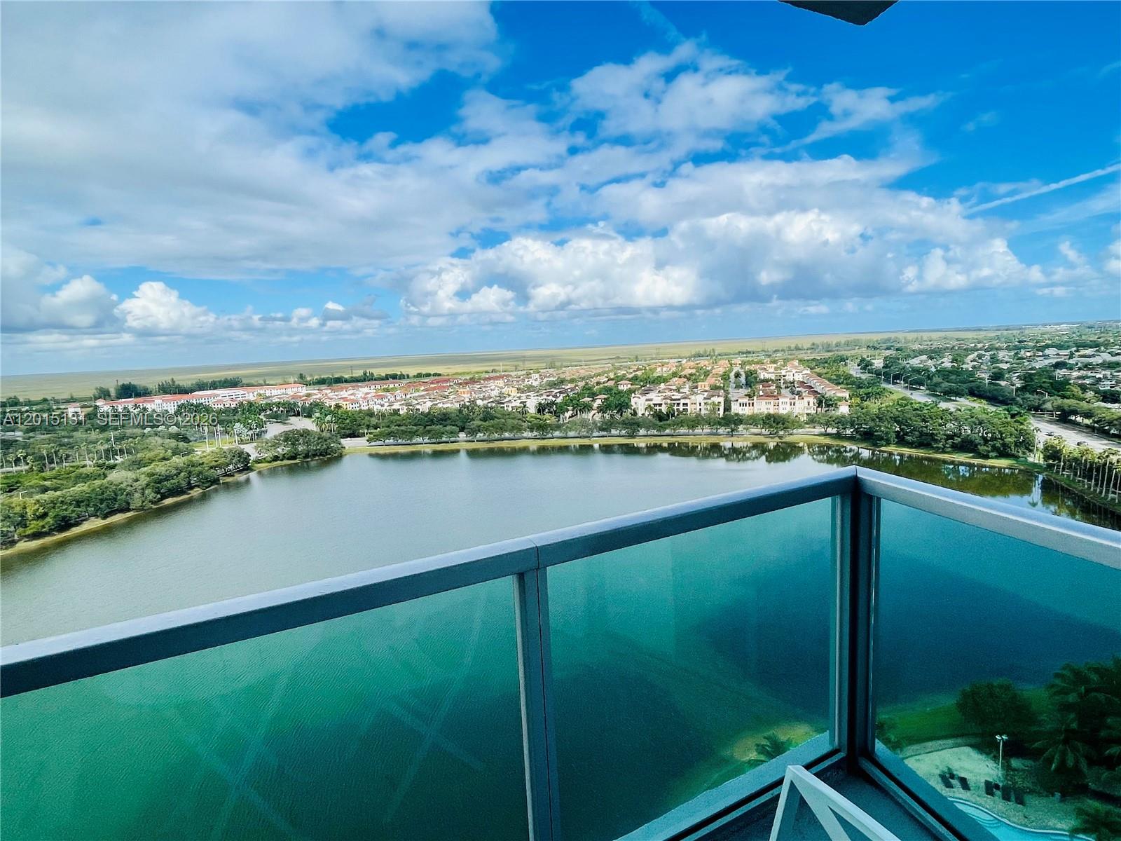 a view of a lake with a city view