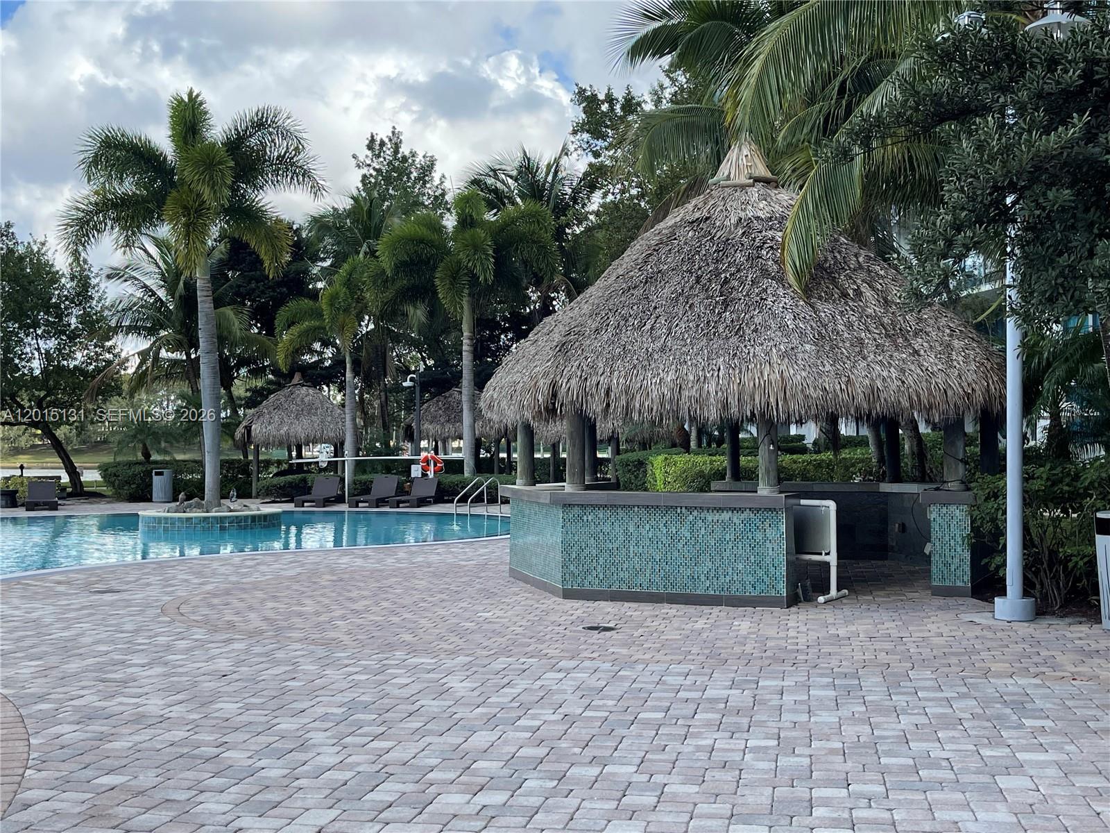 2681 North Flamingo Road, Unit 2004S Sunrise, FL 33323 - Photo 20 of 26 a view of a backyard