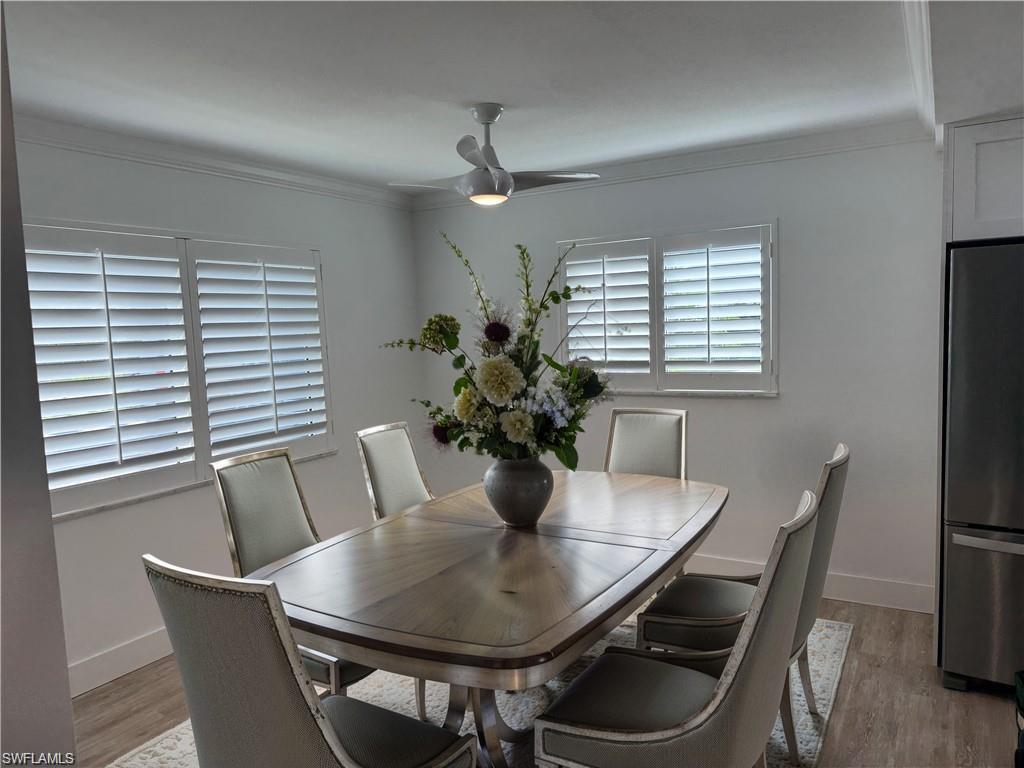 4170 Crayton Road, Unit C3 Naples, FL 34103 - Photo 3 of 20 Virtual Staged Dining area