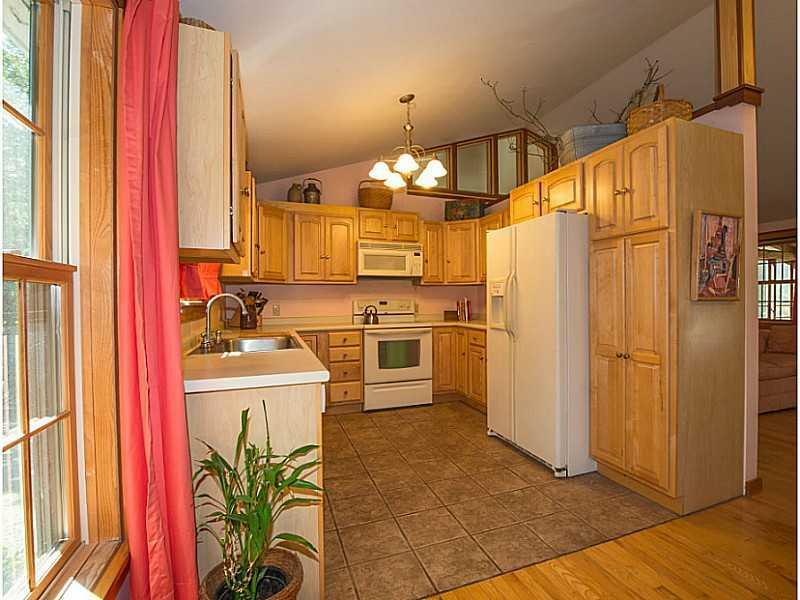 120 Barters Island Road Boothbay, ME 04537 - Photo 12 of 31 Kitchen. Kitchen with wood cupboards...