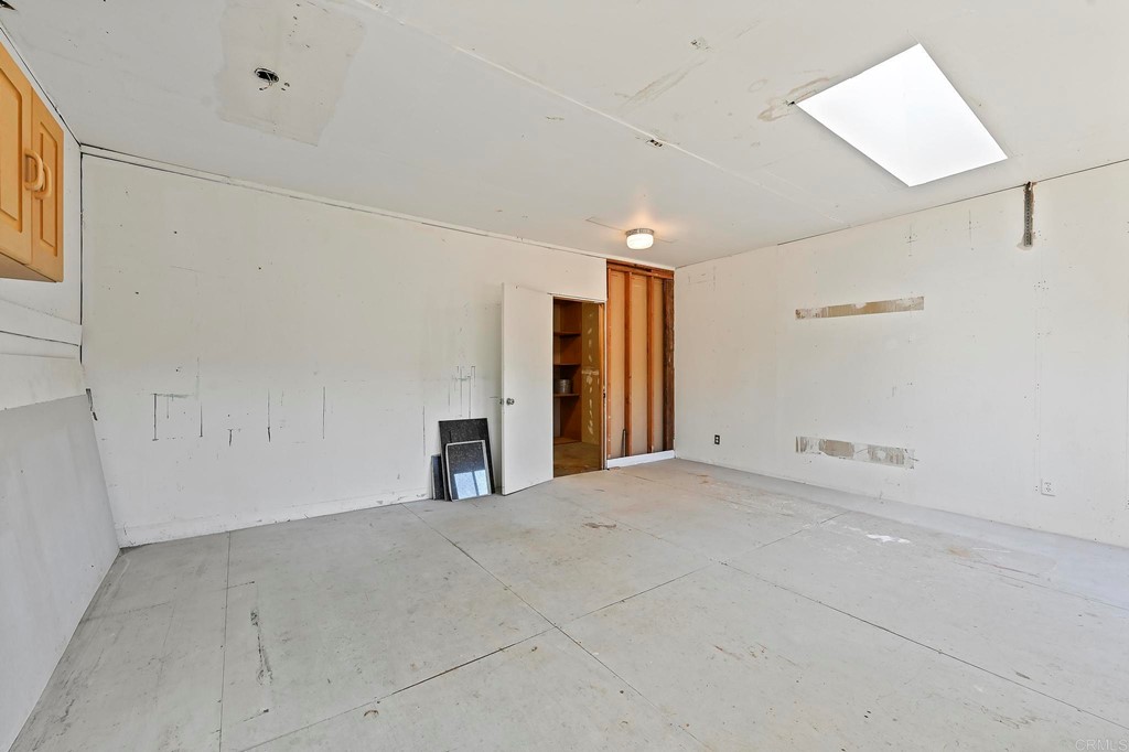 837 Passiflora Avenue Encinitas, CA 92024 - Photo 36 of 42 a view of an empty room with a window