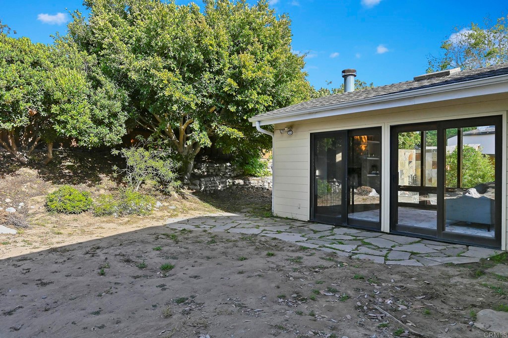 837 Passiflora Avenue Encinitas, CA 92024 - Photo 39 of 42 a view of a house with a porch