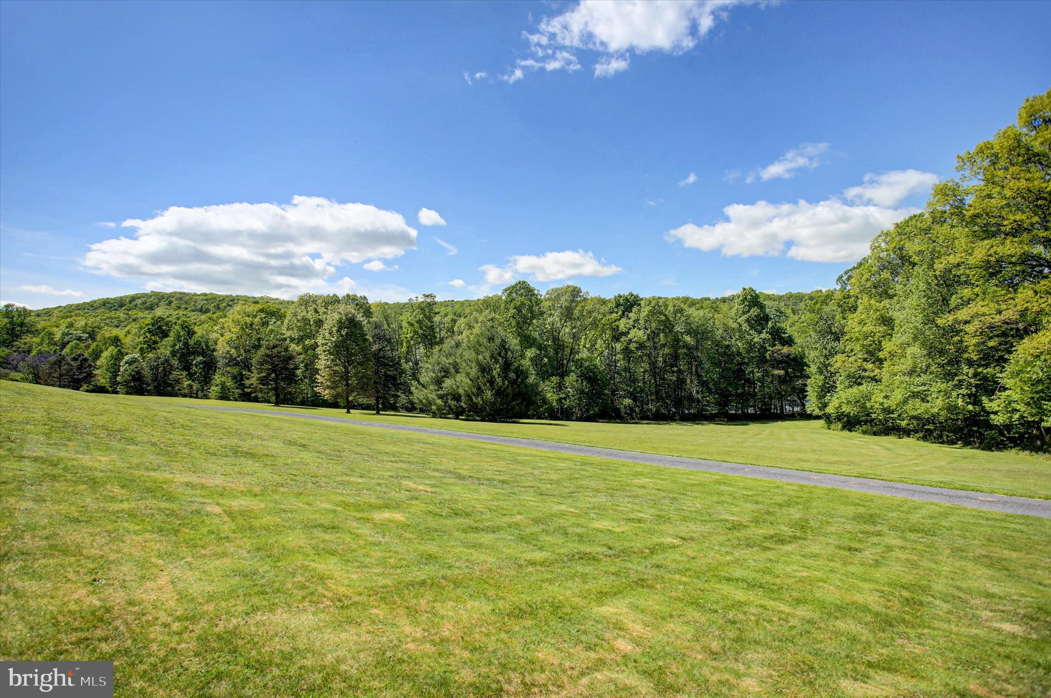 98 Peach Glen Road Gardners, PA 17324 - Photo 74 of 85 a view of a big yard with lots of green space and mountain view
