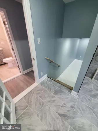 a bathroom with a sink toilet and vanity
