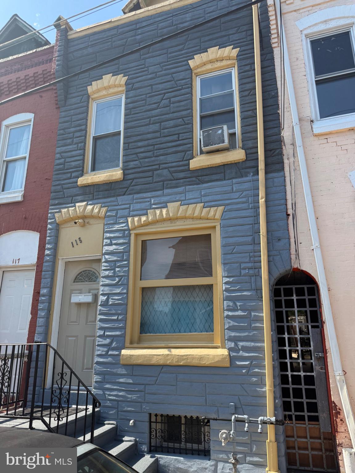 115 West Elm Street Reading, PA 19601 - Photo 3 of 13 Charming facade with bold colors.
