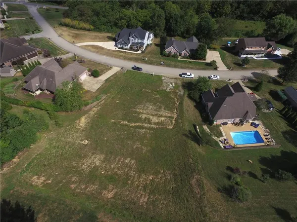 an aerial view of residential house with outdoor space