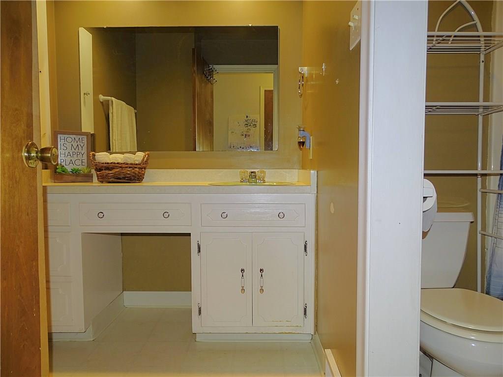 865 Edgewood Road Beaver Falls, PA 15010 - Photo 20 of 24 The hall bathroom upstairs has a separate tub shower area and a large vanity.