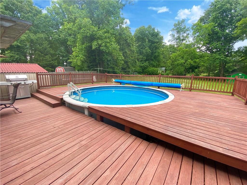 865 Edgewood Road Beaver Falls, PA 15010 - Photo 22 of 24 There is plenty of room for loungers around the pool.