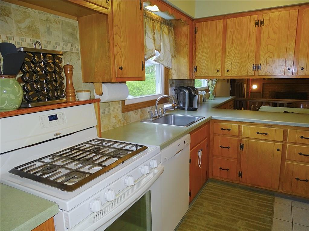 865 Edgewood Road Beaver Falls, PA 15010 - Photo 9 of 24 The kitchen has a u-shaped configuration that works very well for cooking.