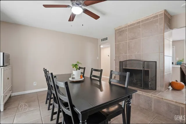 a view of walk in closet with clothes