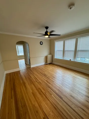 a view of a livingroom with wooden floor