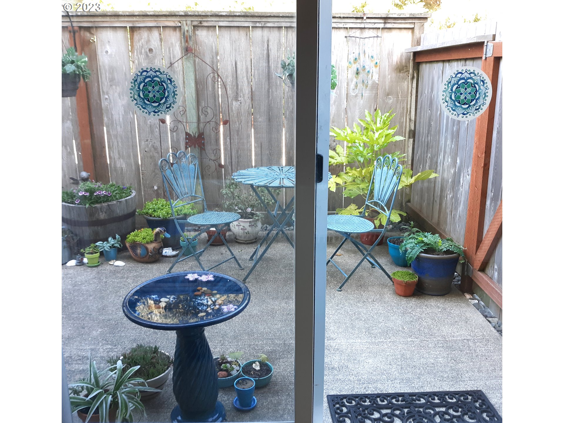 1340 9th Street, Unit 4 Florence, OR 97439 - Photo 16 of 31 a table with potted plants and has more things on it