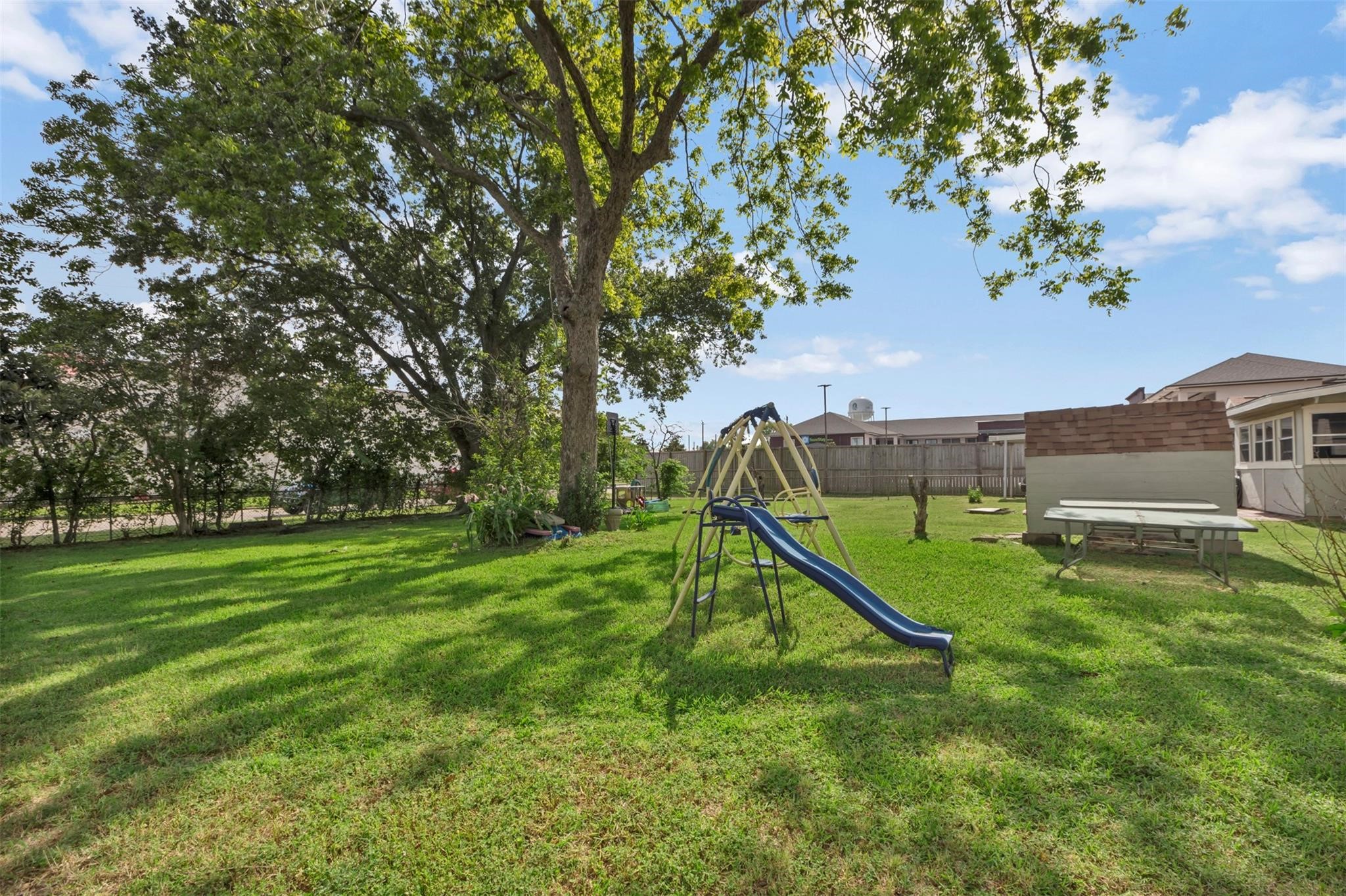 808 Morrell Street Baytown, TX 77520 - Photo 4 of 25 a view of a garden with a slide