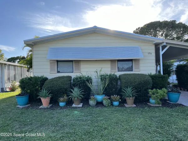 $189,000 | 1216 Gardenia Drive, Barefoot Bay, FL 32976