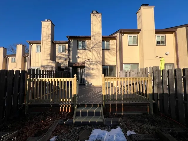 a view of a balcony with chairs