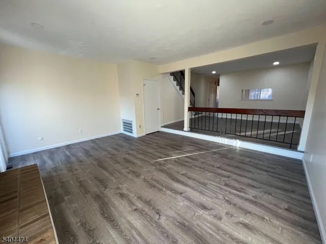 a view of livingroom with wooden floor