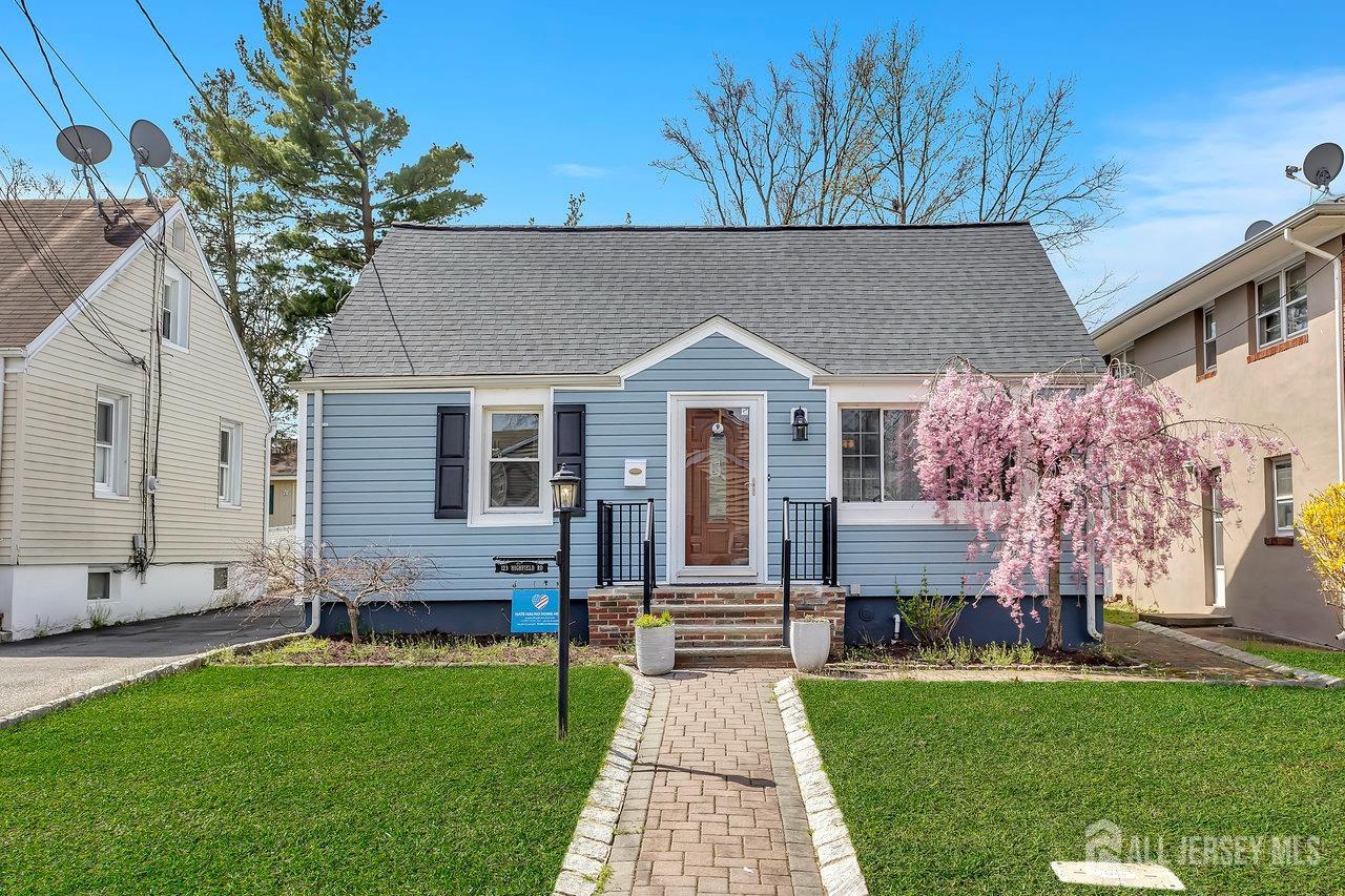123 Highfield Road Colonia, NJ 07067 - Photo 2 of 30 a house view with a garden space