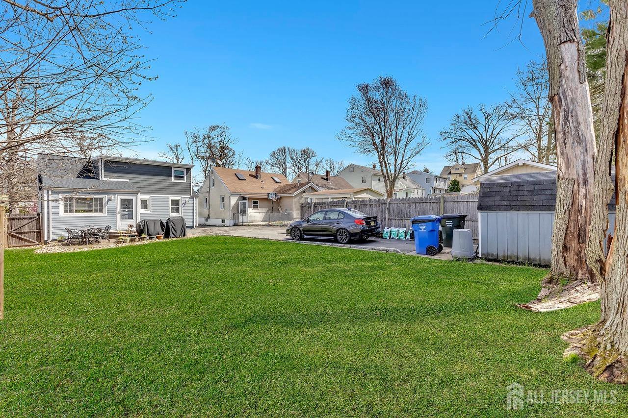 123 Highfield Road Colonia, NJ 07067 - Photo 29 of 30 a view of a house with backyard