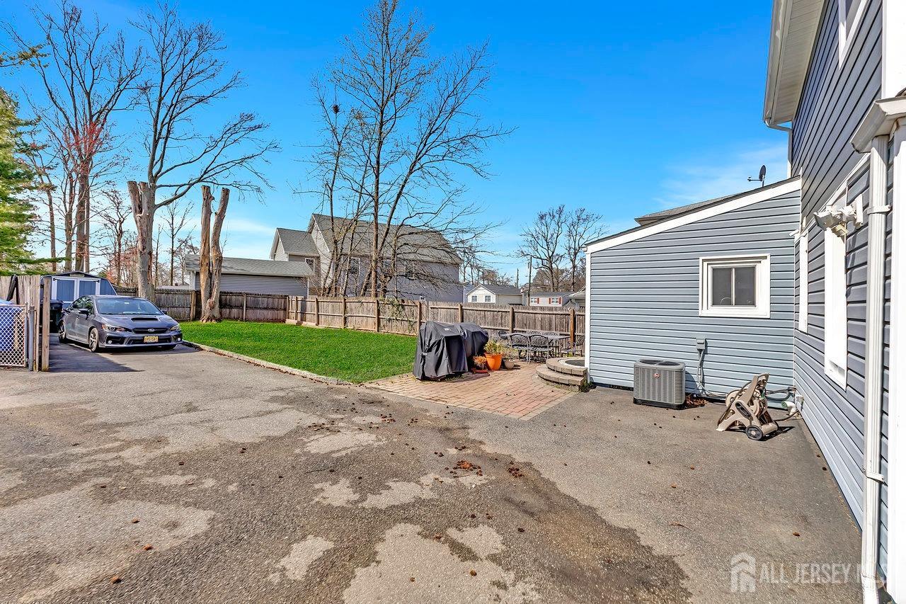 123 Highfield Road Colonia, NJ 07067 - Photo 30 of 30 a view of a house with a patio