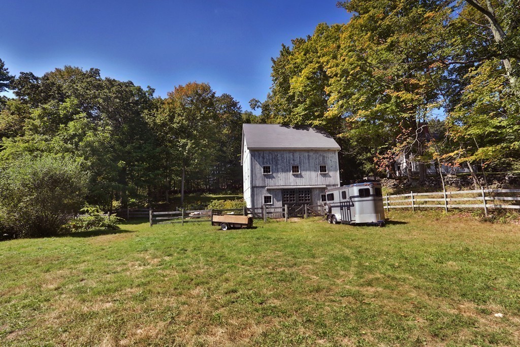 82 Baldpate Road Boxford, MA 01921 - Photo 17 of 20 a view of a house with swimming pool and sitting area