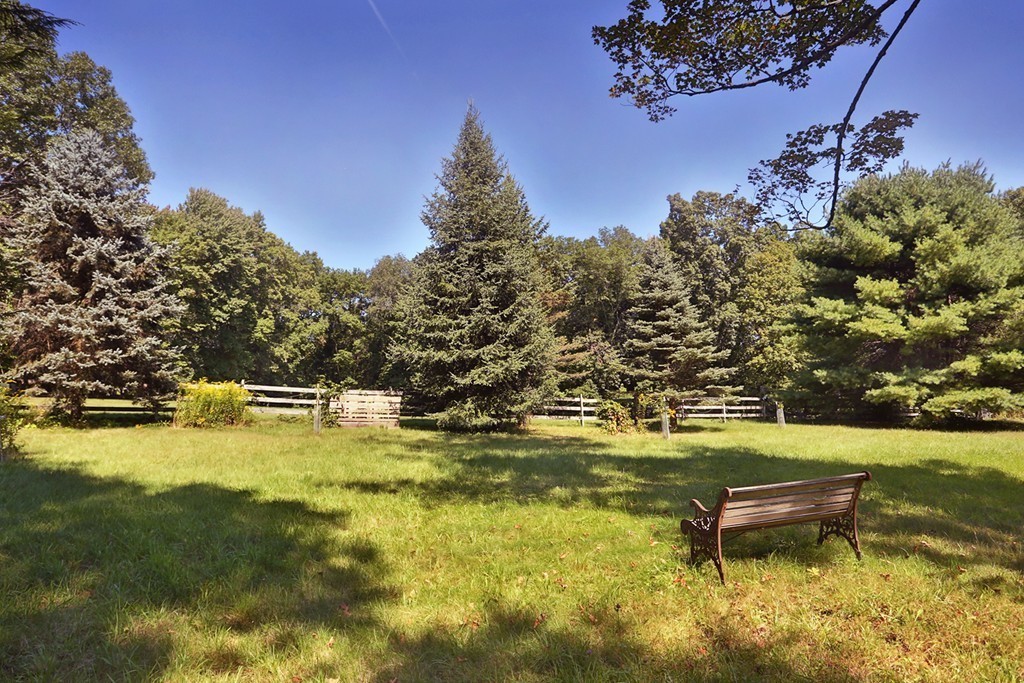 82 Baldpate Road Boxford, MA 01921 - Photo 5 of 20 a swimming pool with some trees in the background