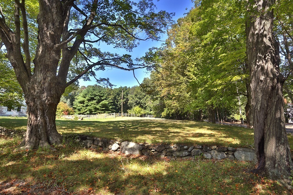 82 Baldpate Road Boxford, MA 01921 - Photo 6 of 20 a view of a big yard with large trees