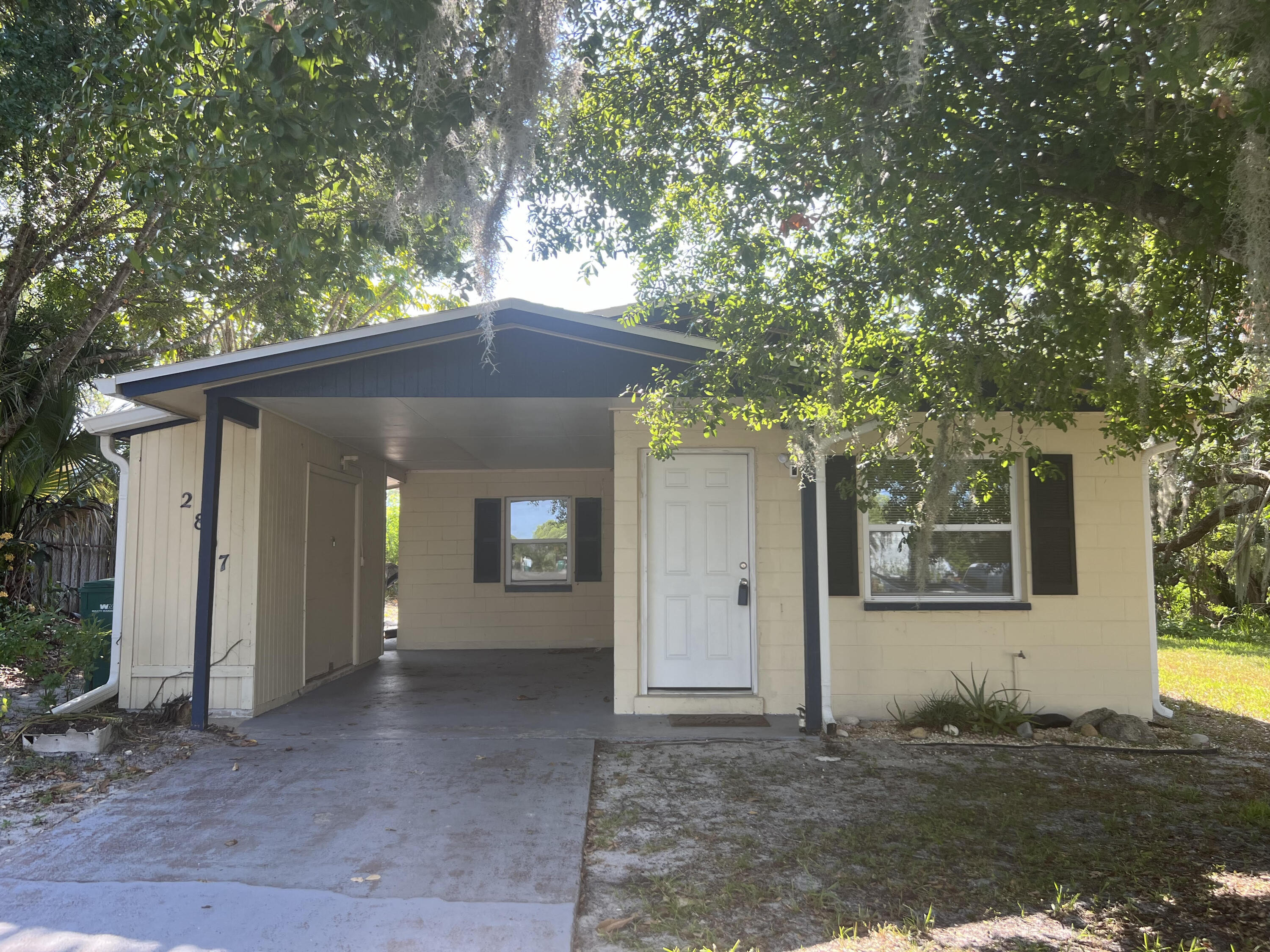 2807 South Vassar Street Melbourne, FL 32901 - Photo 1 of 12 a view of a house with a yard