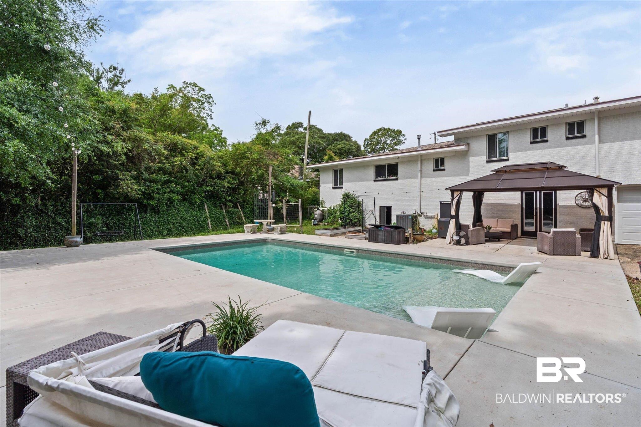 4213 Shan Drive East Mobile, AL 36693 - Photo 23 of 35 Outdoor living area featuring a rectangular swimming pool with integrated sun shelf